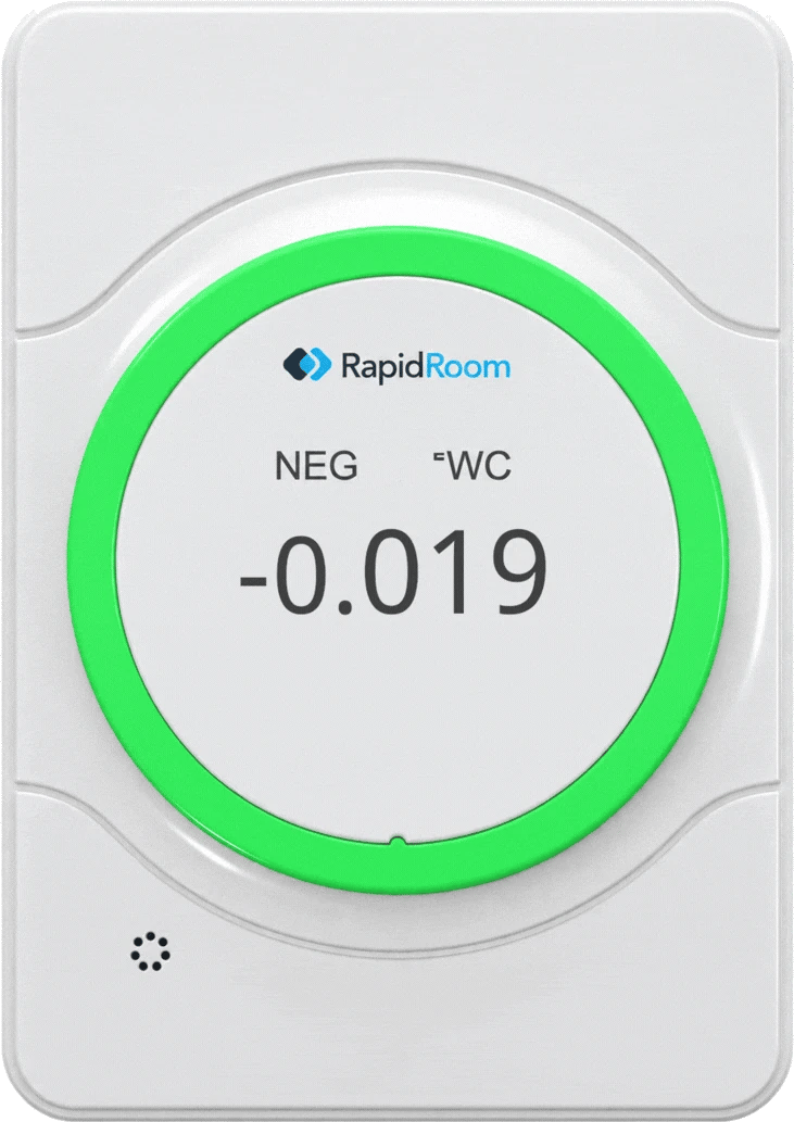 On-site display showing a live negative pressure reading of -0.019 inches of water column, ring lit green